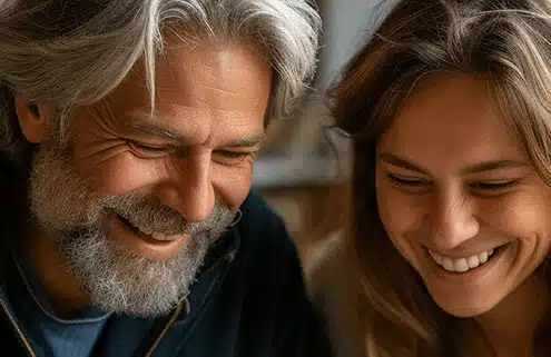 Image of man and woman completing a jigsaw puzzle.