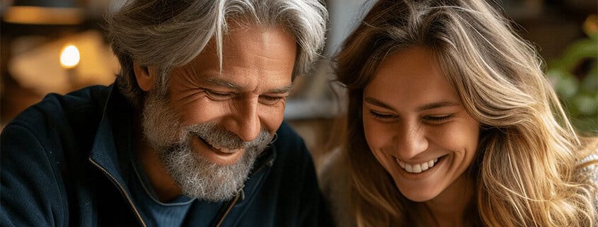 Image of man and woman completing a jigsaw puzzle.